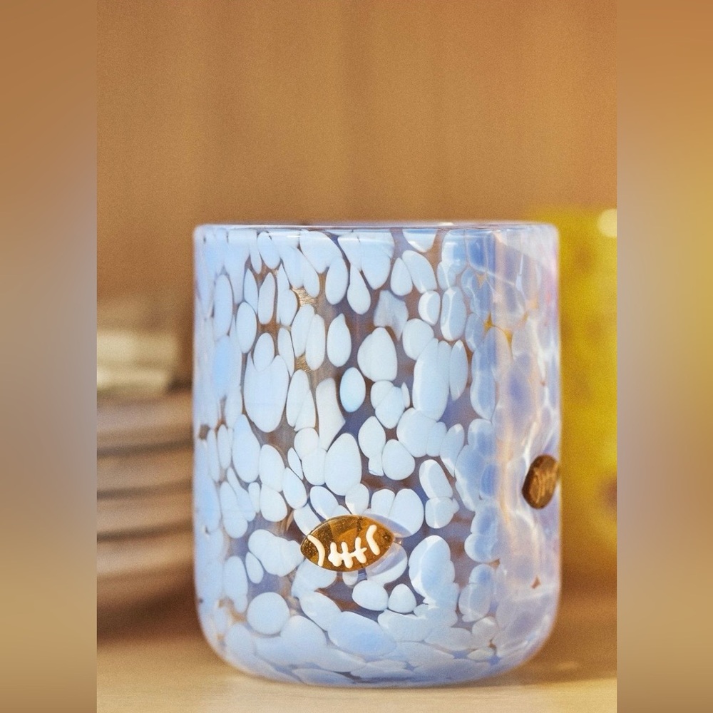 Anthropologie Blue Speckled Glass Tumbler w/ footballs.